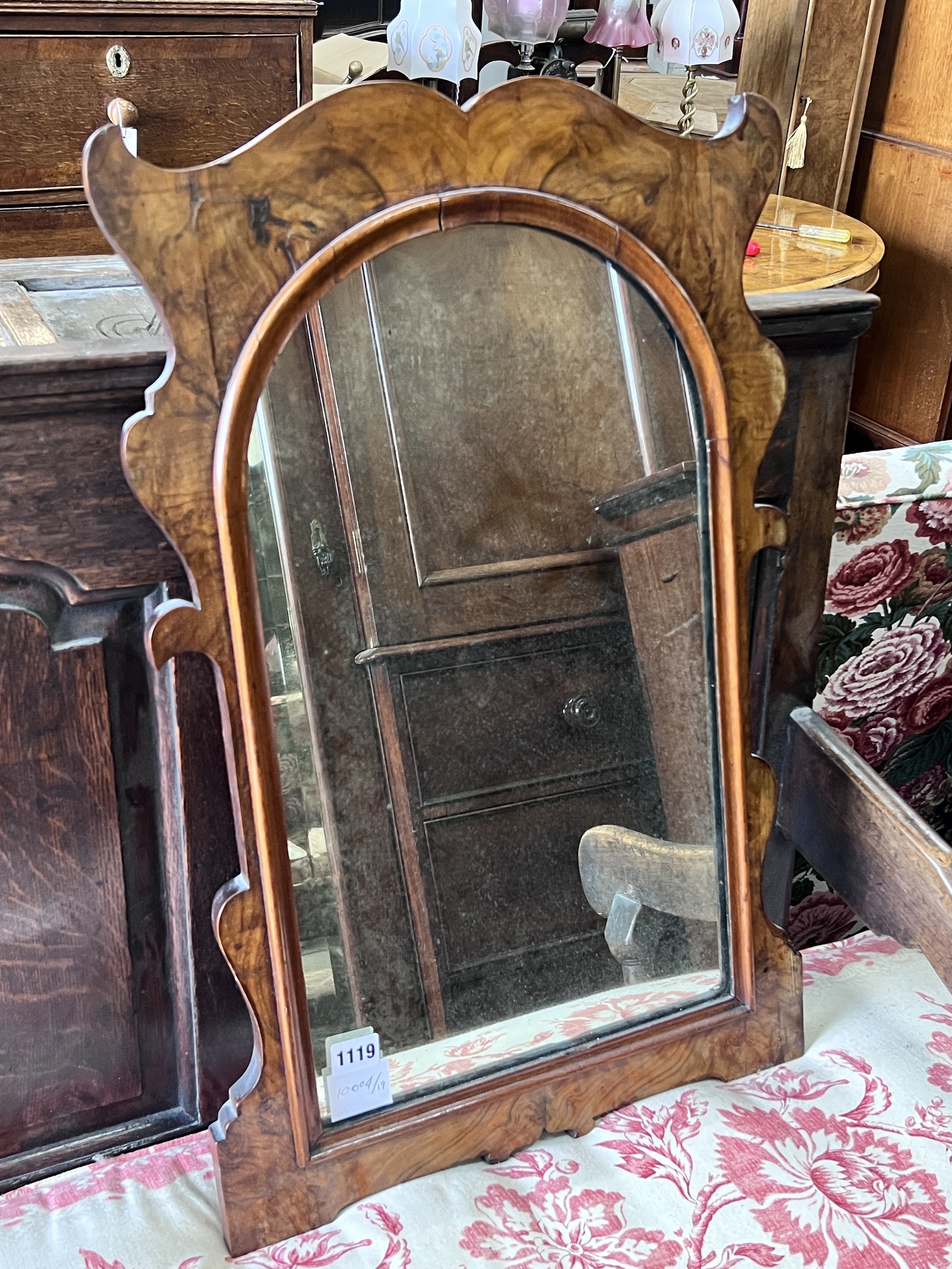 An 18th century style walnut fretwork cut wall mirror, width 43cm, height 68cm